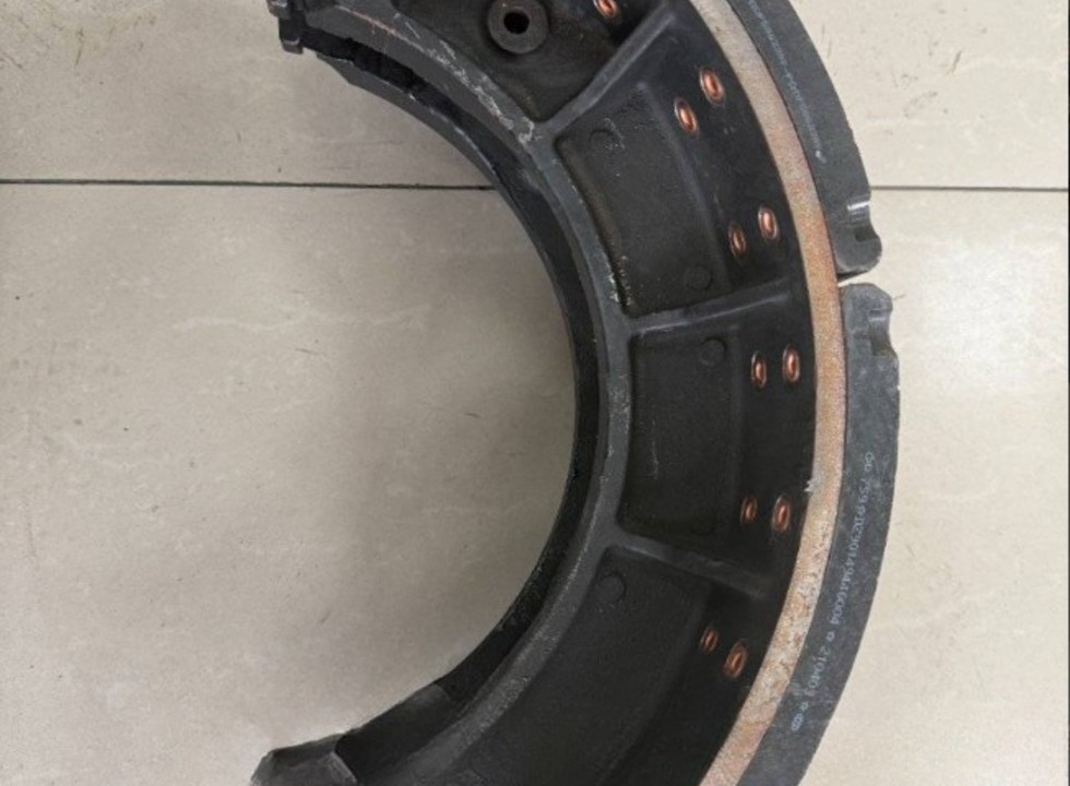 Колодка тормозная переднего моста (в сборе с накладками) LGMG MT60/MT86 (DZ90149446003)